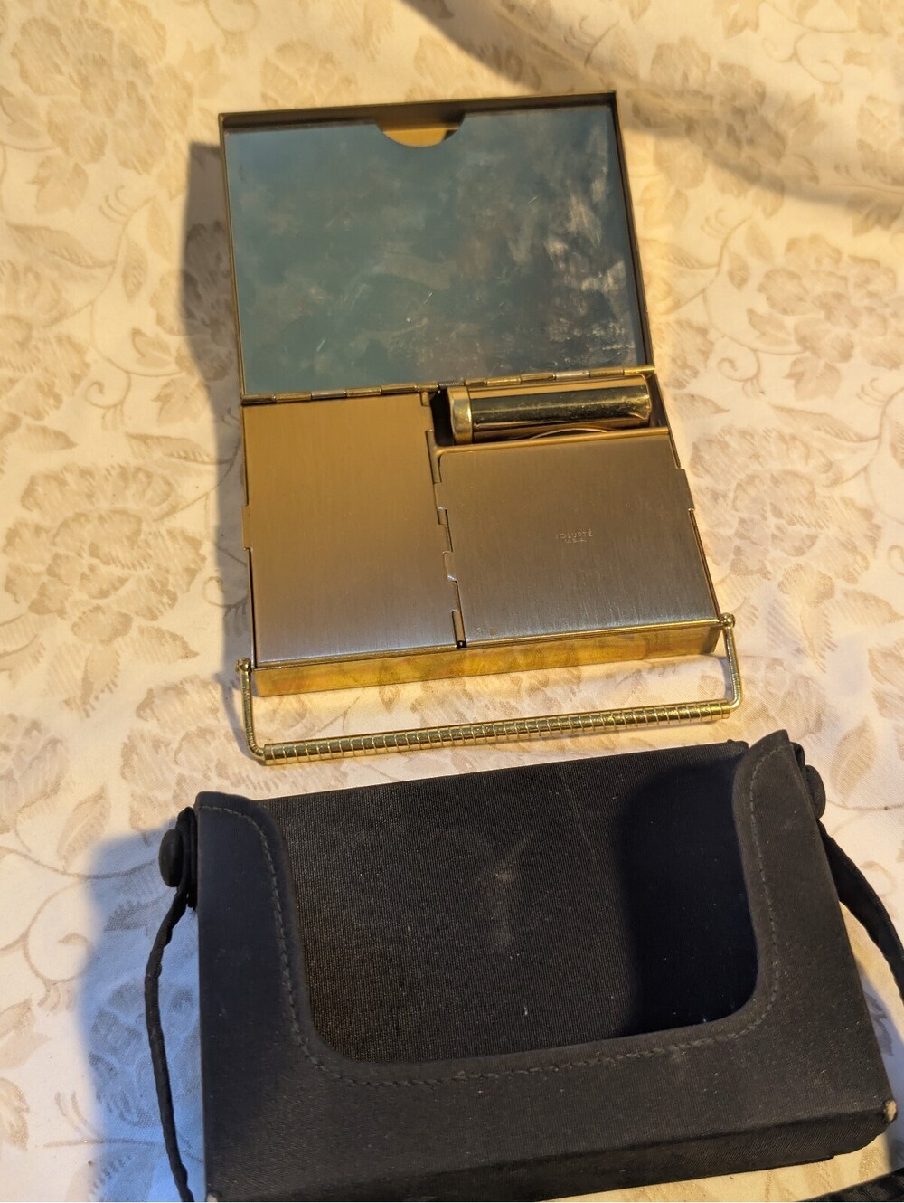 Vintage Volupte Gold Tone Cosmetic Compact with Black Carrying Pouch